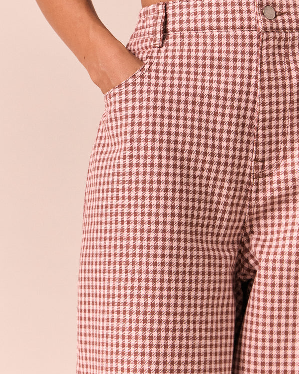 model wears remi taffy mini gingham denim jeans 