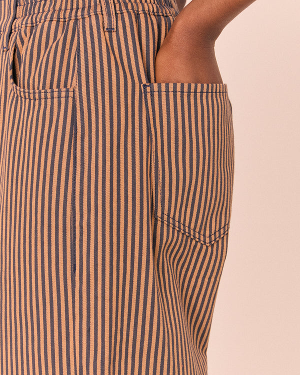 model wears remi nutmeg pinstripe denim jeans