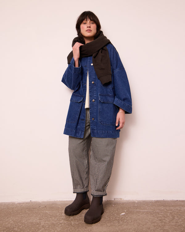 model wears bea mid blue denim jacket