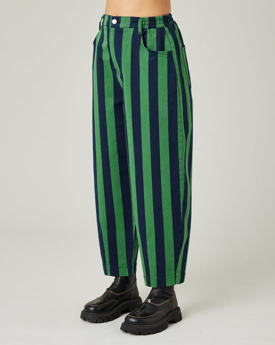 model wears navy and grass stripe remi left