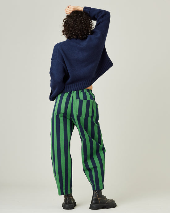 model wears navy and grass stripe remi front