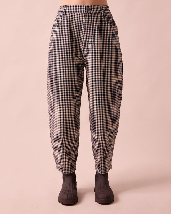 model wears remi black and white mini gingham denim jeans front