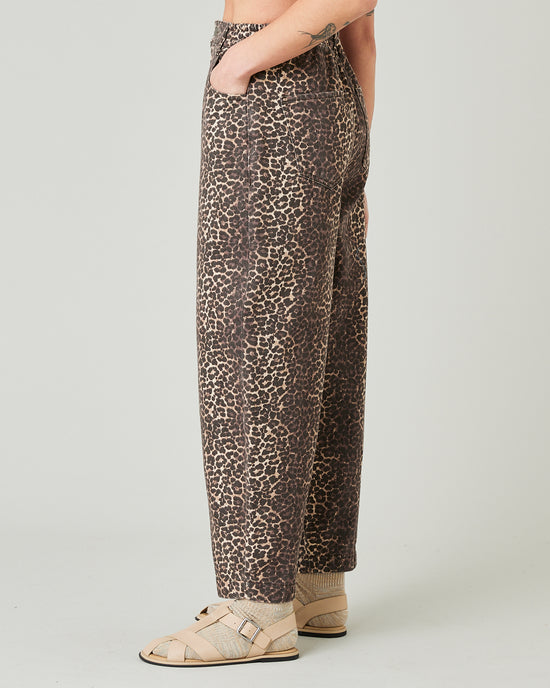 model wears leopard print remi jeans left