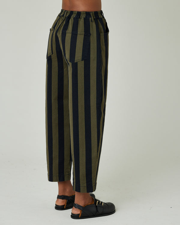 model wears black and olive remi denim trousers right 