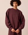 model wears riley burgundy jersey jumper