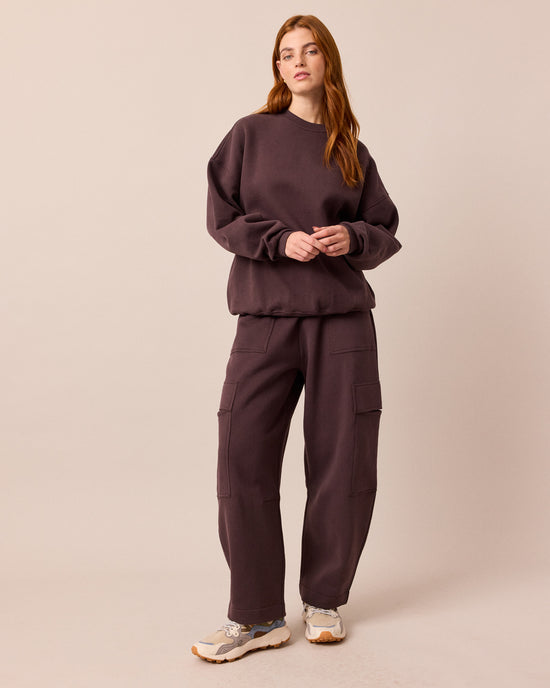 model wears riley prune jersey jumper