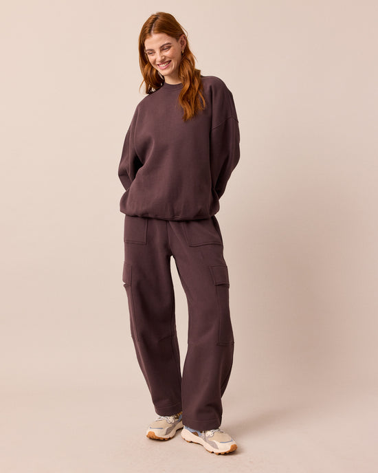 model wears riley prune jersey jumper