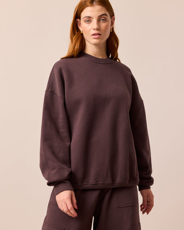 model wears riley prune jersey jumper