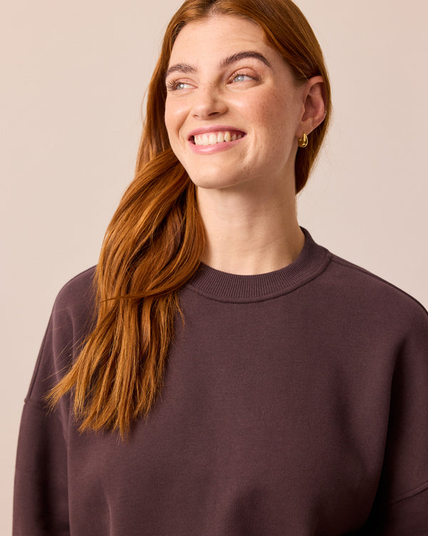 model wears riley prune jersey jumper