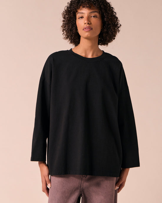 model wears robyn black jersey top