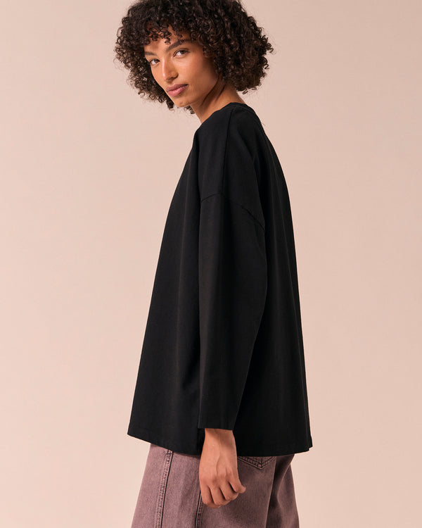model wears robyn black jersey top