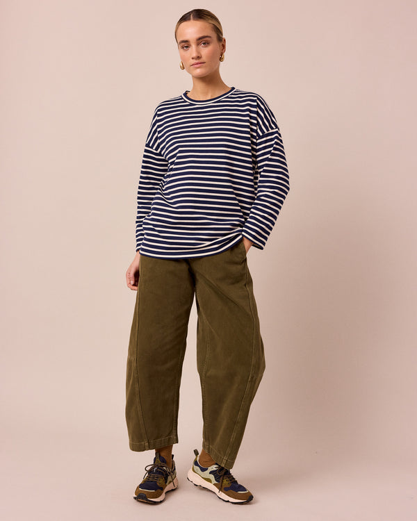 model wears robyn navy and ecru stripe jersey top