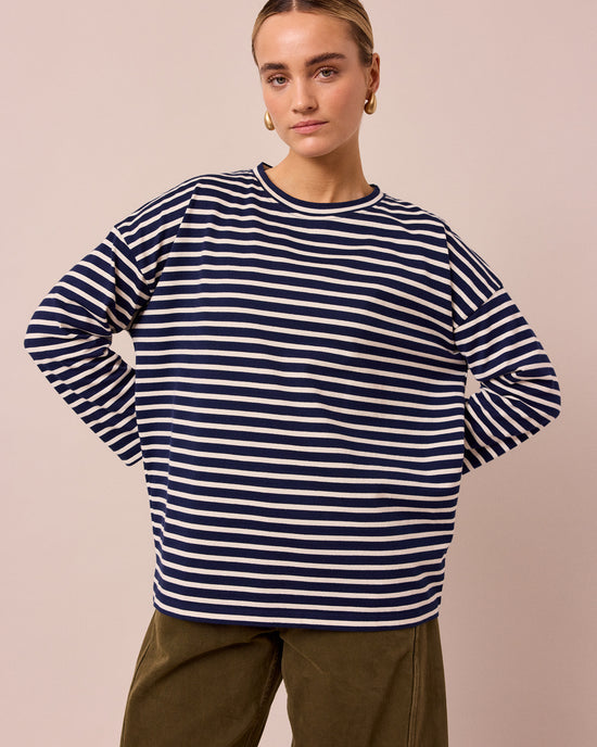 model wears robyn navy and ecru stripe jersey top