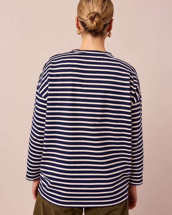 model wears robyn navy and ecru stripe jersey top