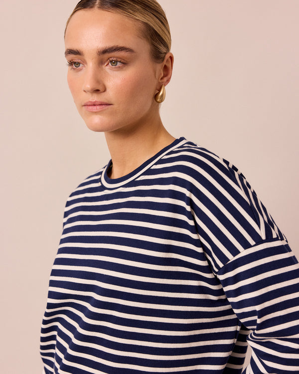 model wears robyn navy and ecru stripe jersey top