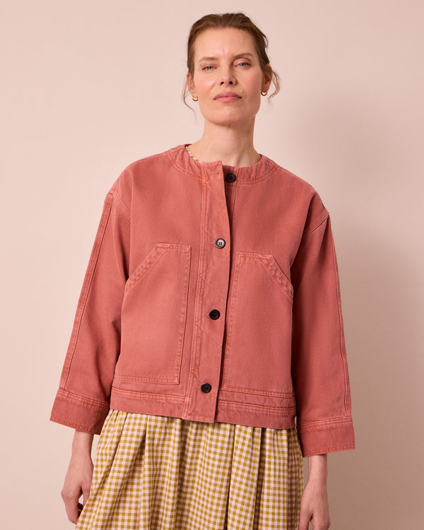 model wears rosa clay pink denim jacket