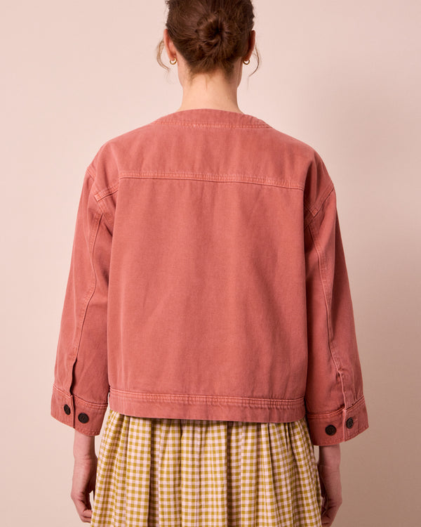 model wears rosa clay pink denim jacket