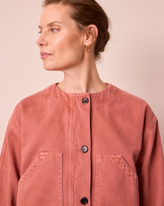 model wears rosa clay pink denim jacket