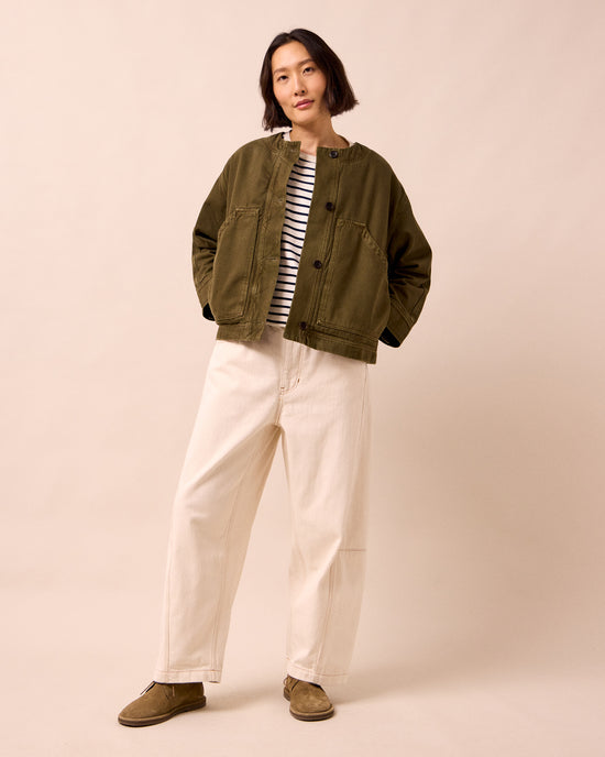 model wears rosa olive denim jacket