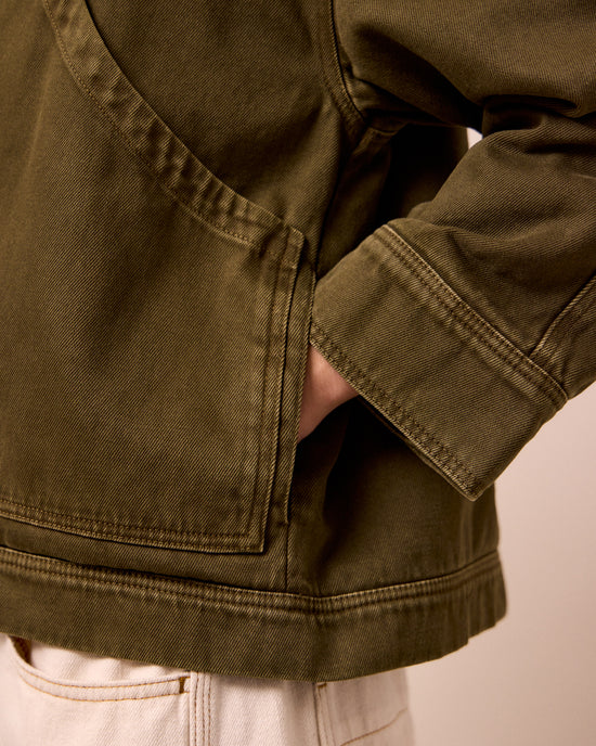 model wears rosa olive denim jacket