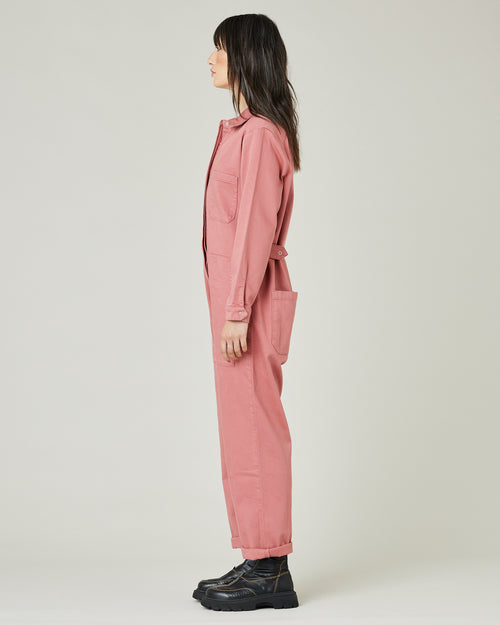 model wears rose denim coverall