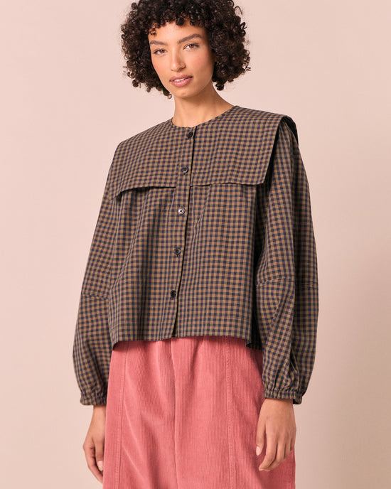 model wears rowen fern gingham cotton poplin top