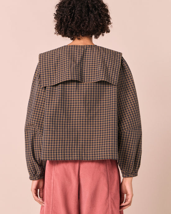 model wears rowen fern gingham cotton poplin top