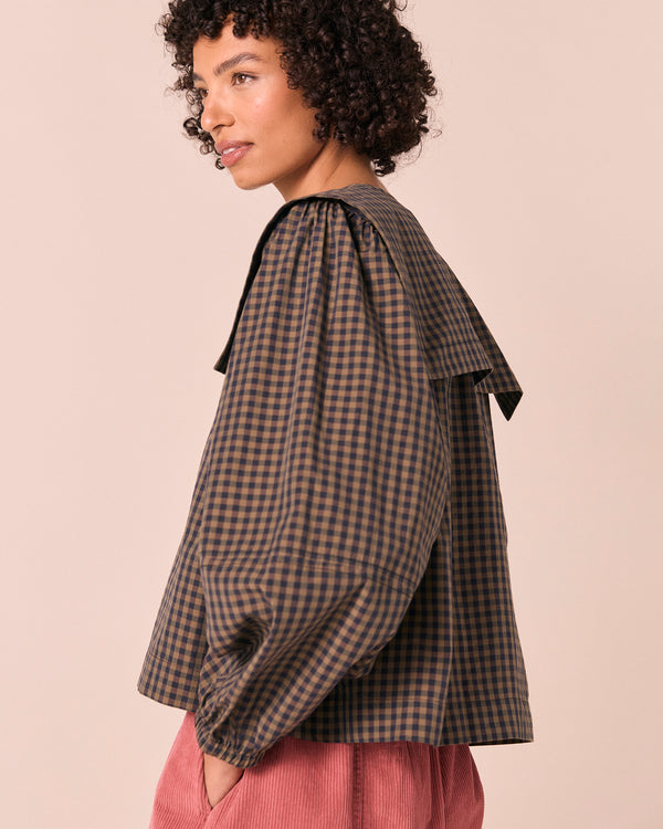 model wears rowen fern gingham cotton poplin top