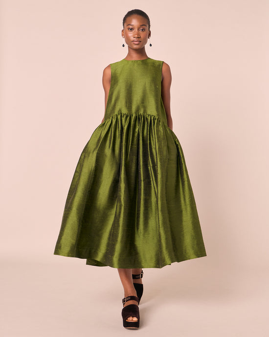 model wears roxy jewel green silk dupion dress