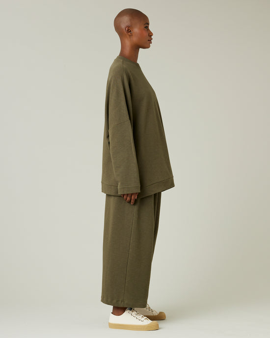 model wears olive jersey ruby trousers