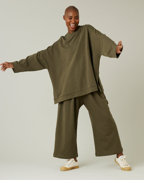 model wears olive jersey ruby trousers