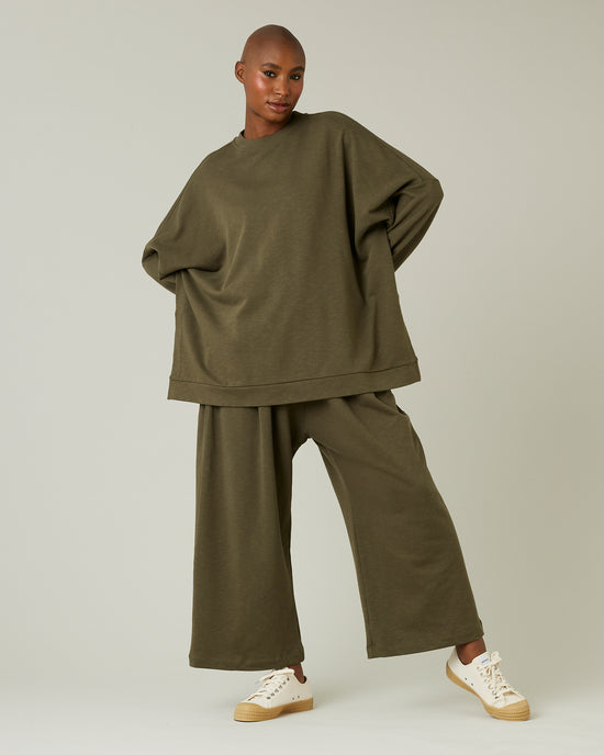 model wears olive jersey ruby trousers