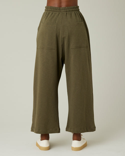 model wears olive jersey ruby trousers back