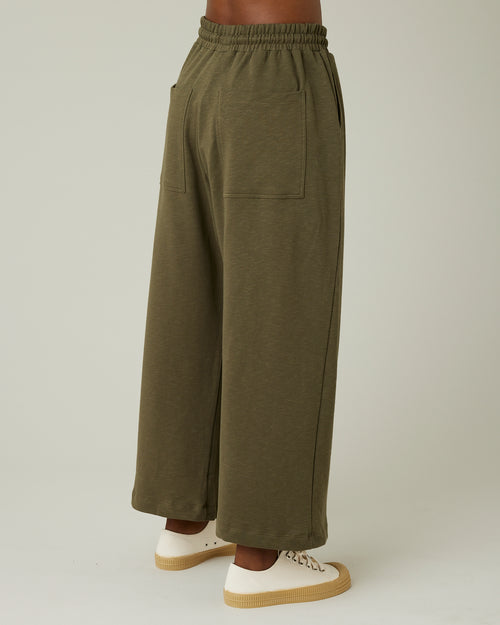 model wears olive jersey ruby trousers right