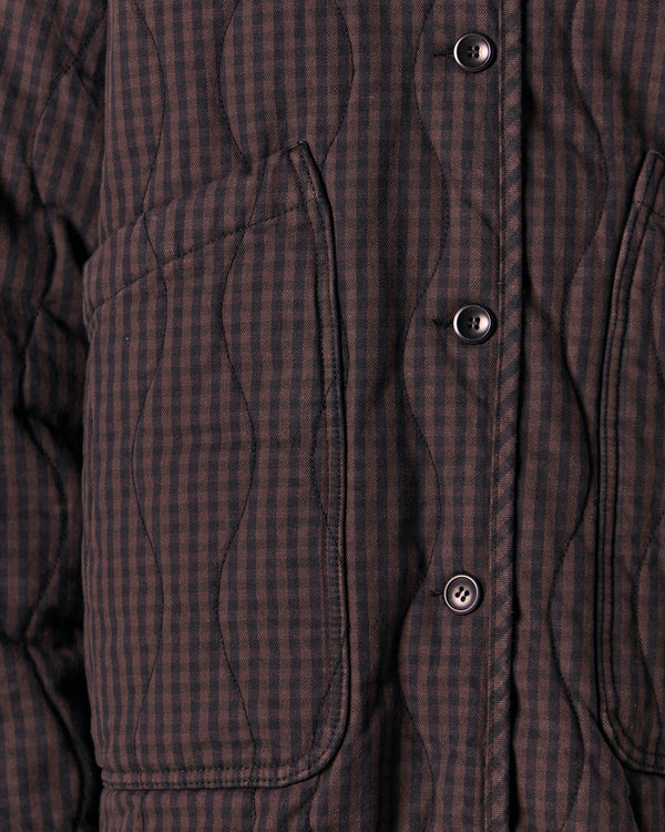 model wears rue dark mulberry gingham quilted denim jacket