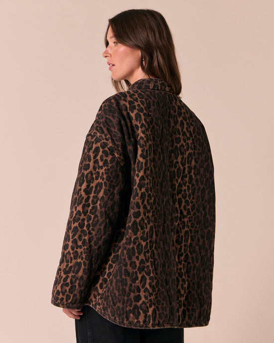 model wears rue dark leopard print denim jacket