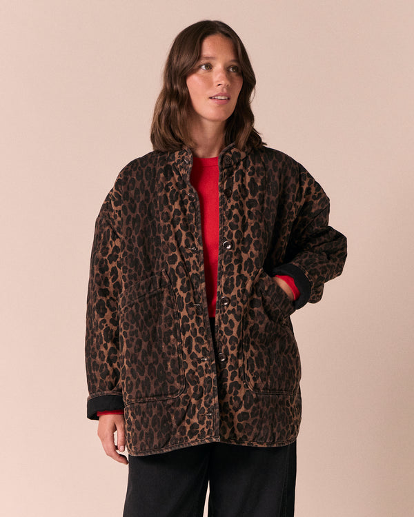 model wears rue dark leopard print denim jacket