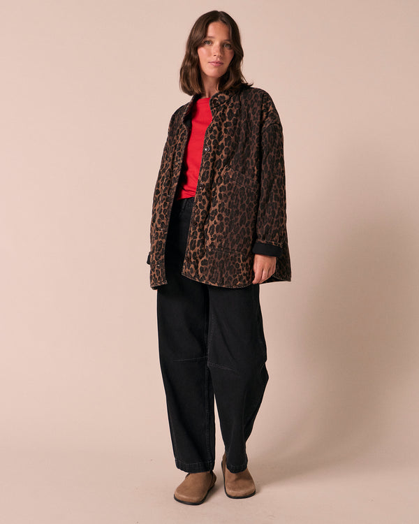 model wears rue dark leopard print denim jacket