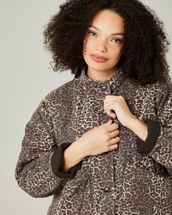 model wears leopard print rue jacket