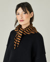 model wears knitted rust stripe neckerchief