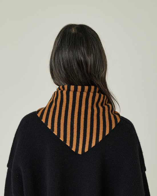 model wears knitted rust stripe neckerchief