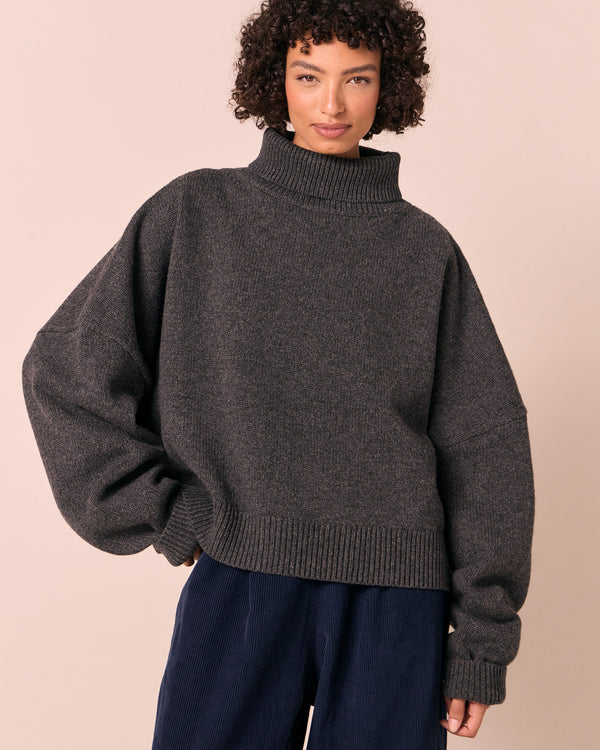 model wears ruth light charcoal knitted jumper