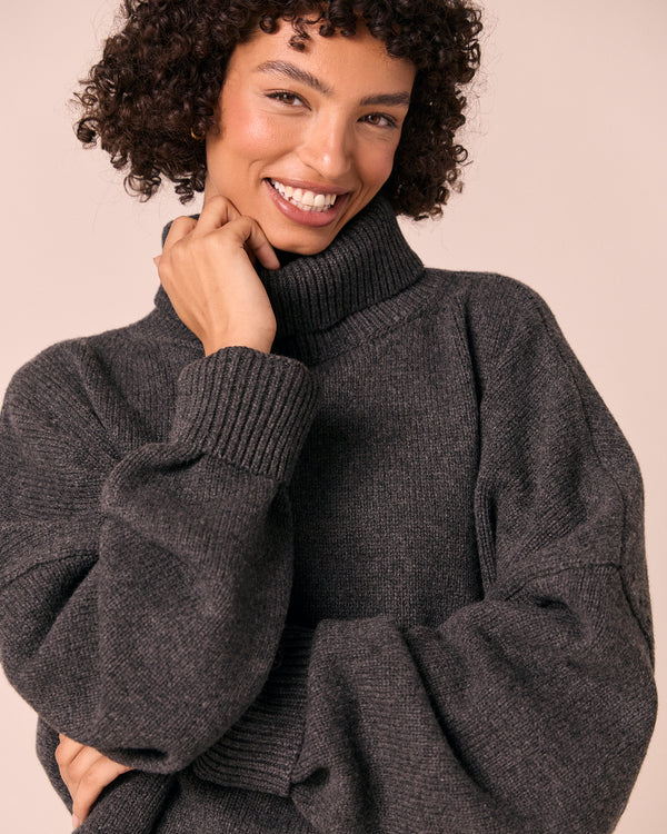 model wears ruth light charcoal knitted jumper