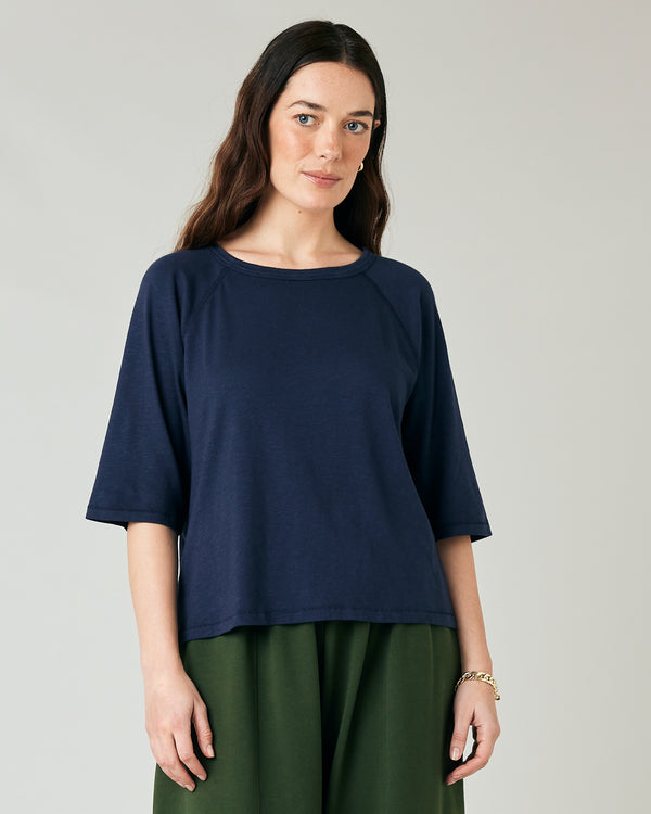 model wears navy jersey raglan top