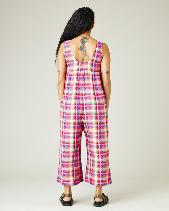 model wears sonny check savannah linen jumpsuit