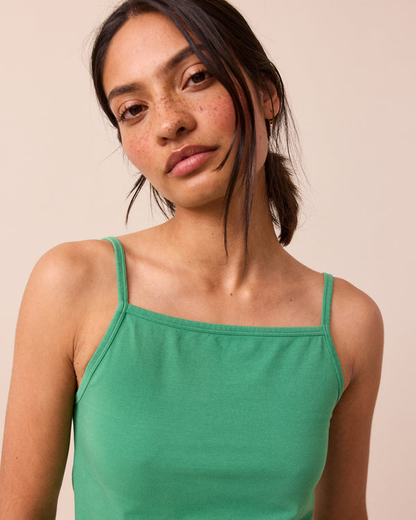 model wears clover vest top
