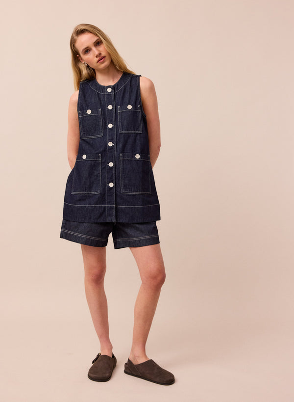 model wears denim jamie waistcoat