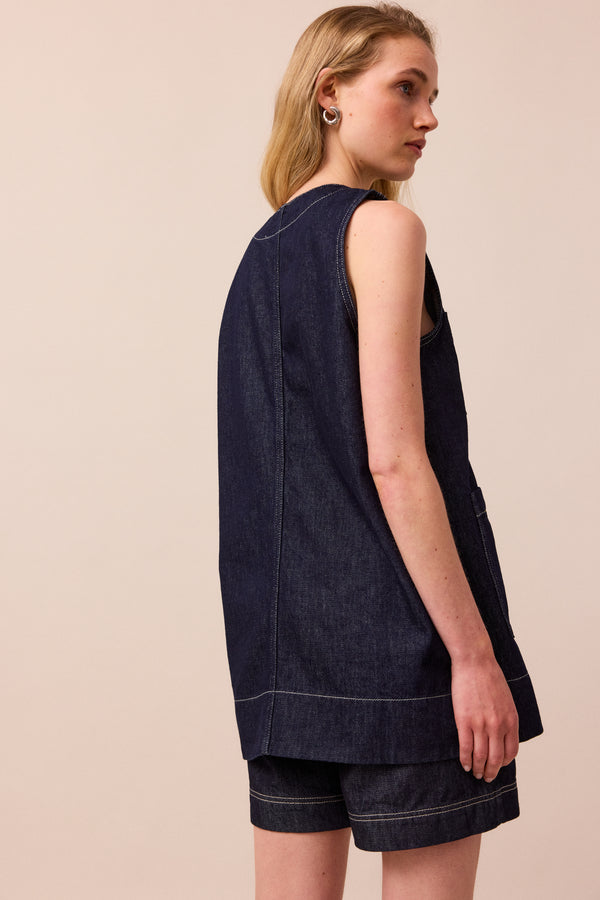 model wears denim jamie waistcoat