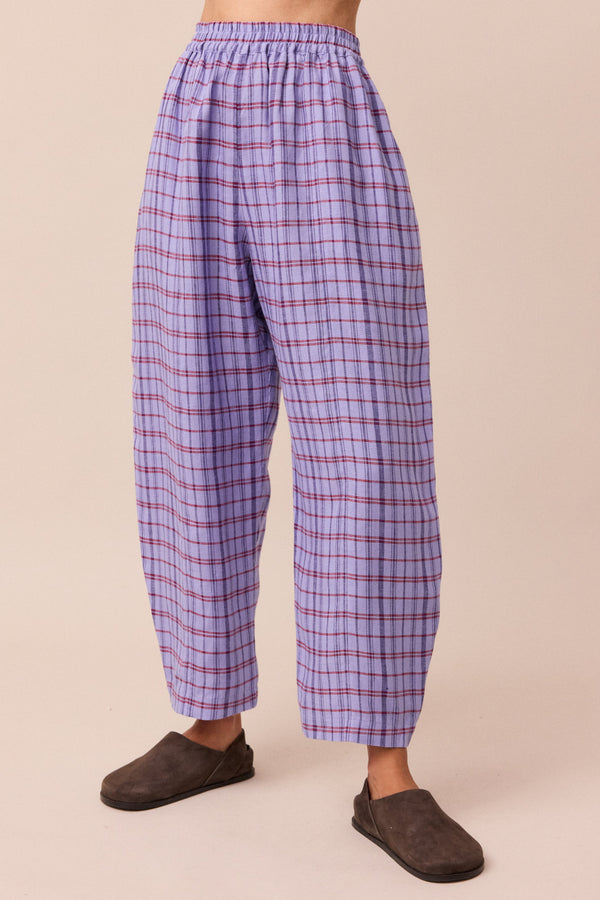 model wears parma violet mabel linen trousers front
