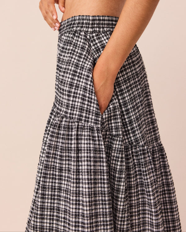 model wears talia seersucker black and white gingham skirt